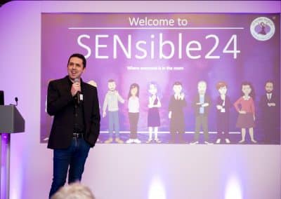 SENsible24 background with all the characters made from the speakers of the SENCO Conference, with Gavin Hawkins on the microphone