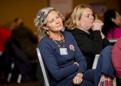 Victoria Bagnall from Connections in Mind CiC listening carefully and smiling at the SENsible24 SENCO Conference