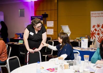 Angharad Welch an Speech and Language Therapist, speaking to a SENCO at the SENsible24 SENCO Conference.